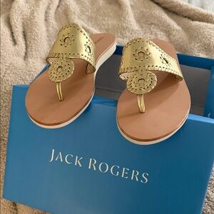 Brand new with box. Never worn! 
Jack Rogers Metallic Gold Thong Sandals
